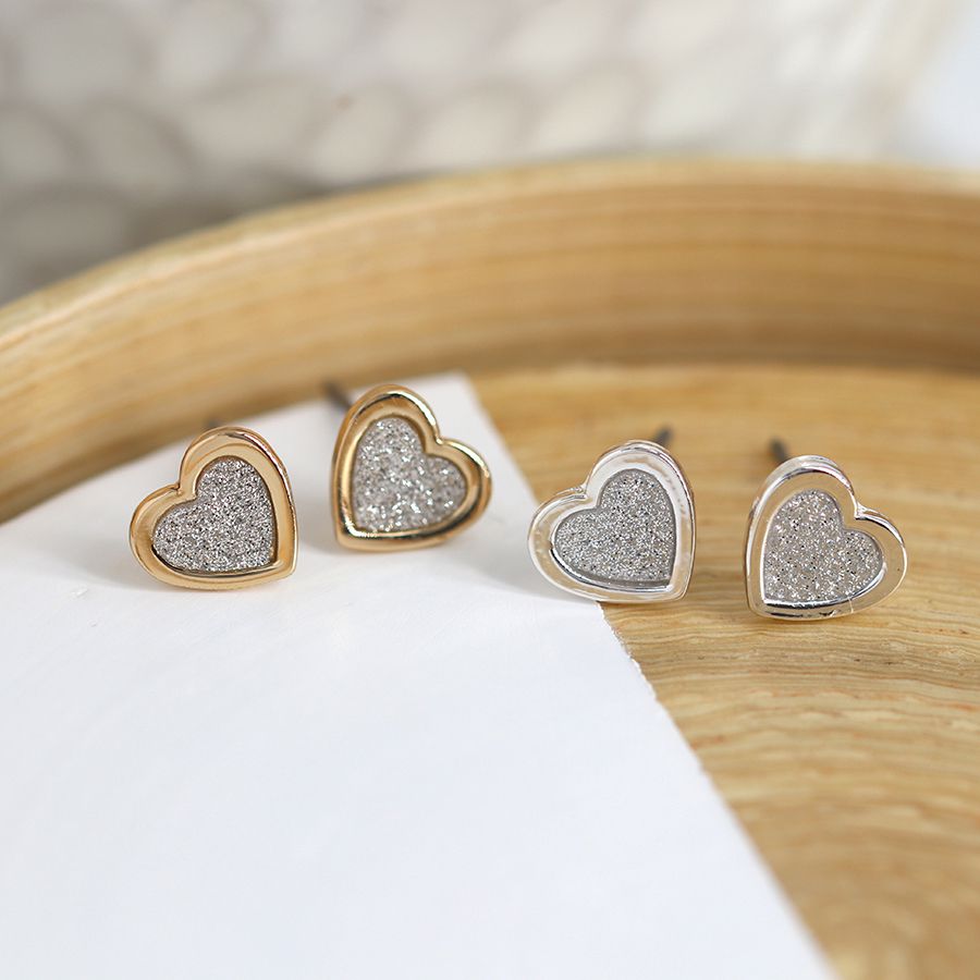 Silver plated and golden finish sparkle heart stud duo