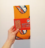 Load image into Gallery viewer, Irn Bru Tea Towel by Cheryl Jones Designs
