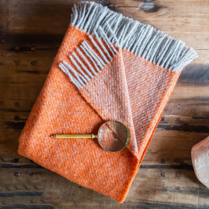 Bos Lifestyle Throw in Pumpkin by Tweedmill Textiles